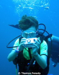 Picture of my son playing with my old UW camera by Thomas Fenady 